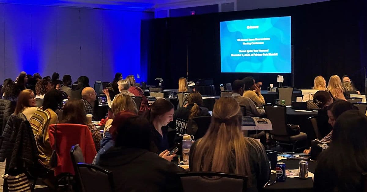 Attendees seated in a conference room during a nursing presentation at the Inova Neuroscience Nursing Conference