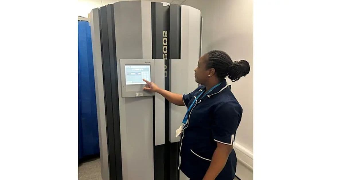Nurse operating phototherapy equipment during the St John's DermAcademy Phototherapy Course